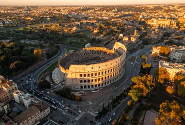 ROME_aerial-drone-view-colosseum-in-rome-cityscape-duri-2026-01-11-10-48-46-utc